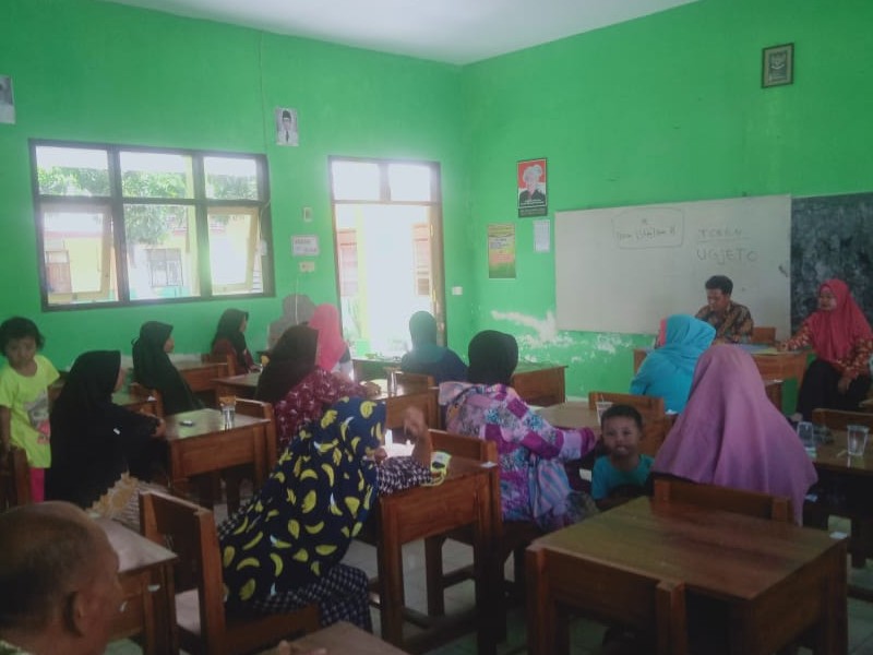 PENGAMBILAN RAPORT BERSAMA WALI MURID SISWA